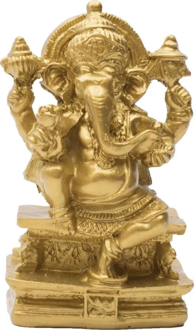 Soška Ganéša - hinduistický bůh s čtyřmi pažemi a sloní hlavou, pomáhá odstraňovat překážky a je bohem vzdělání, poznání a moudrosti