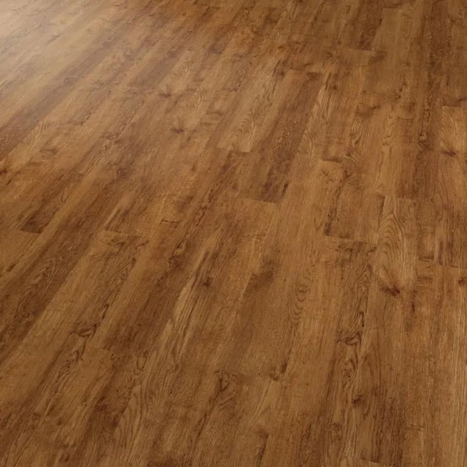 Lepená vinylová podlaha Conceptline s rustikálním dubem a zlatým odstínem, vhodná pro silnou bytovou zátěž